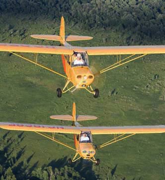 2 Aeronca Champs in flight