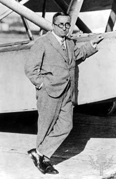 Ernie Heinkel leaning  against someting aeronautical