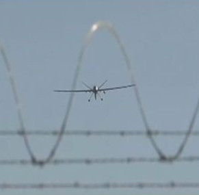 concertina wire W with drone