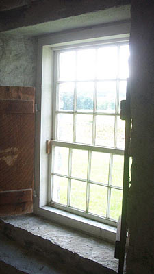 Afternoon light and Round Barn window