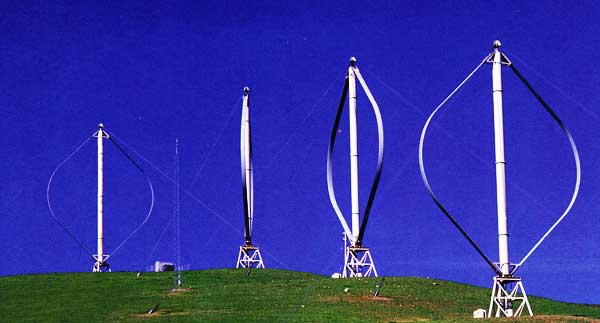 Vertical axis turbines operate in the airflow near the ground.