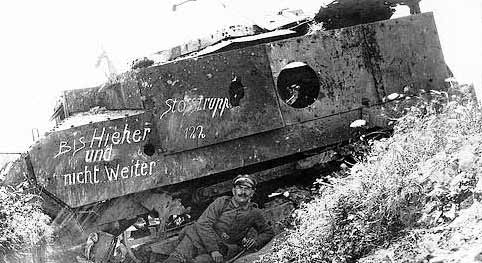WWI-French-Tank-Schneider-with-tagging-and-brave-soldier.jpg