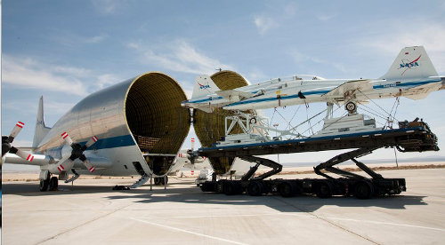 Two T-38s being swallowed by a Super Guppy
