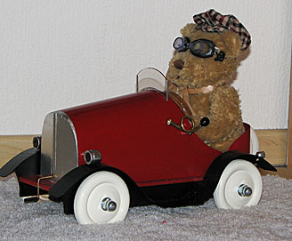 Wolfie's Pedal Car and Teddie
